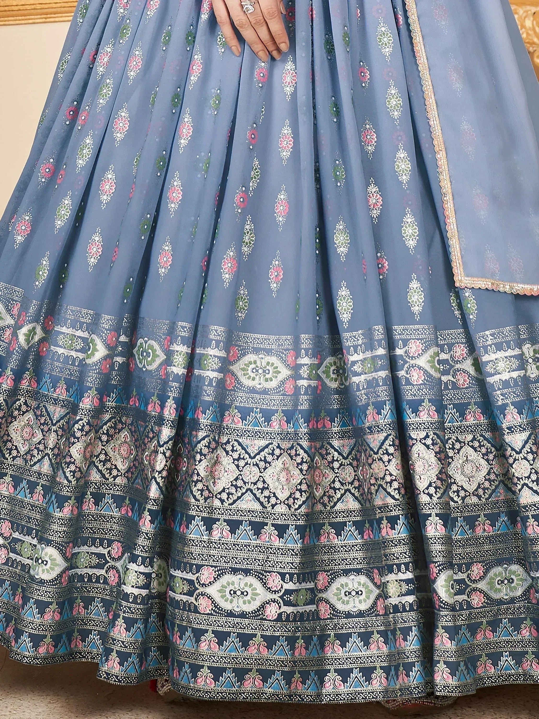 Blue printed lehenga choli with floral and geometric border, ethnic Indian wear