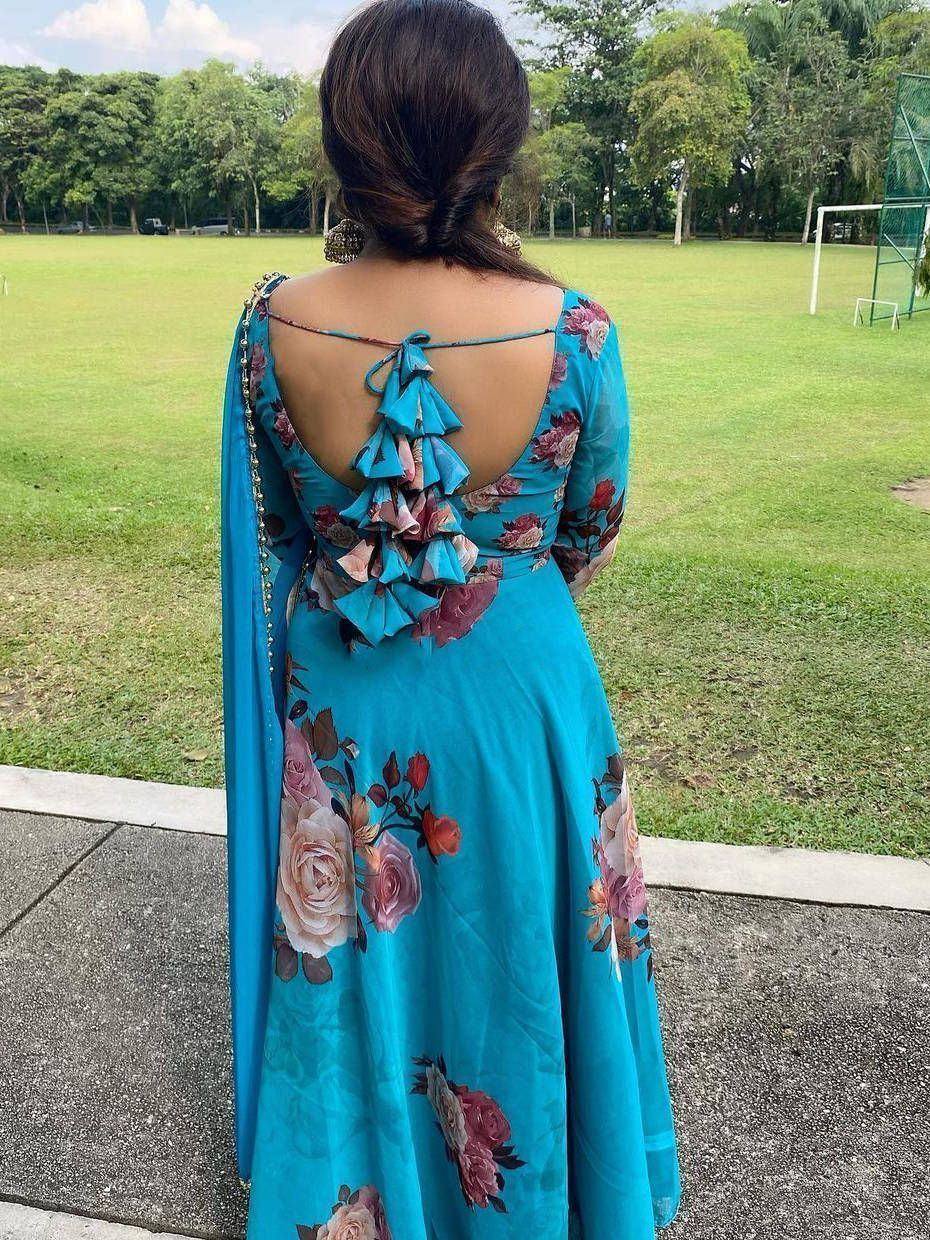 Blue floral ethnic gown with ruffled back detail, perfect for Indian occasions