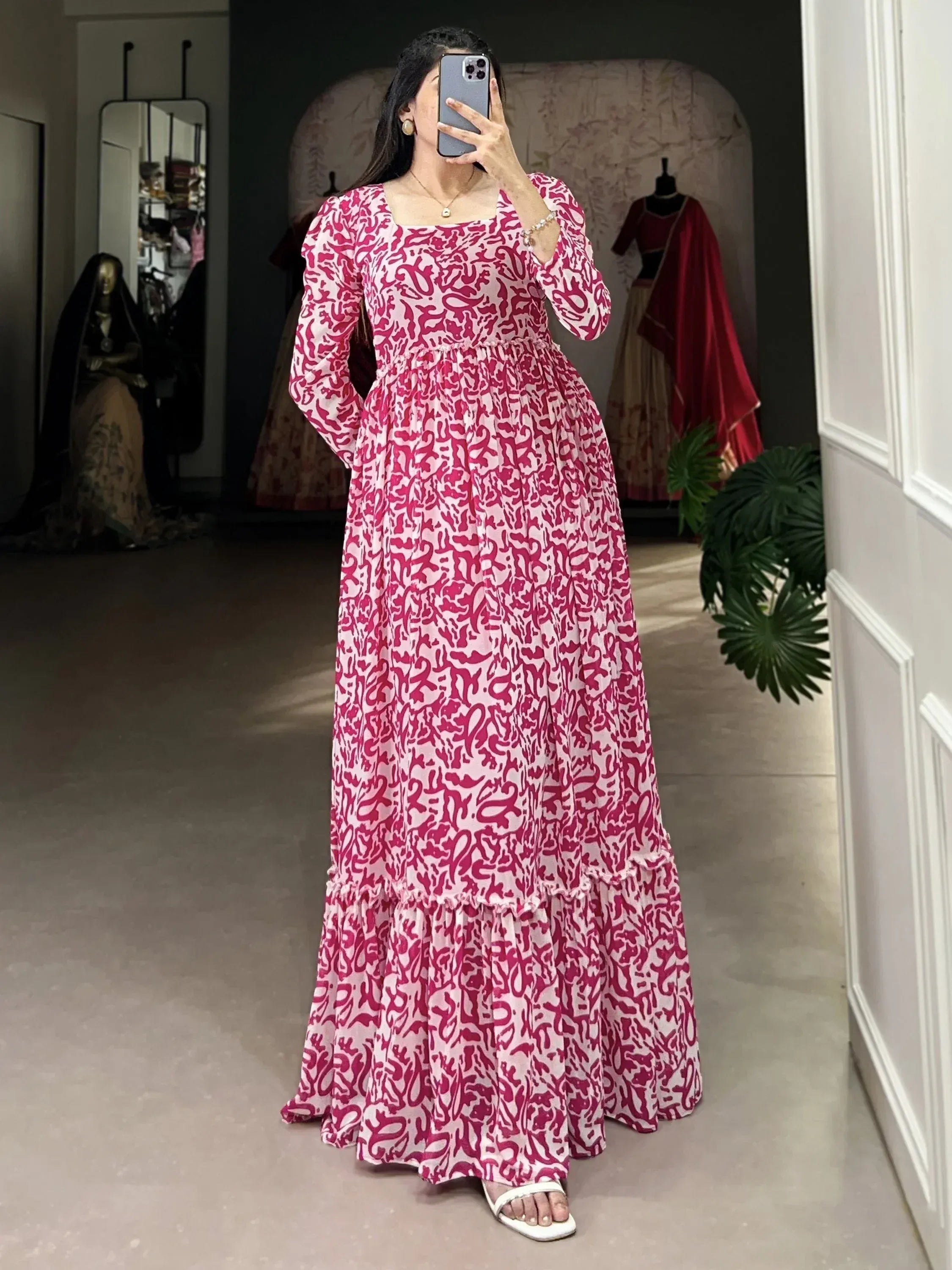 Pink and white abstract print maxi dress with puff sleeves, perfect for ethnic occasions and festive wear.