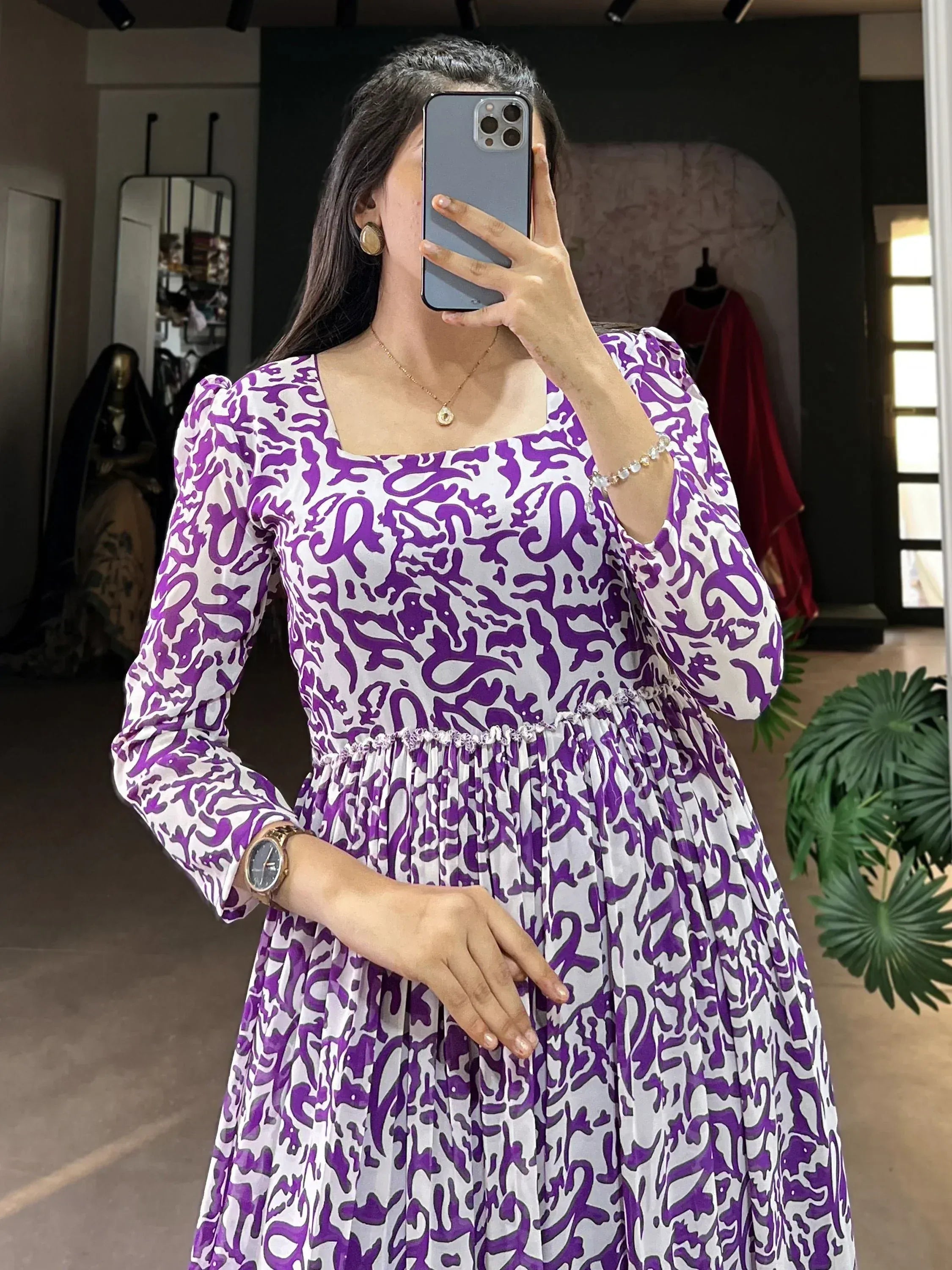 Purple and white printed ethnic gown with puff sleeves and square neck