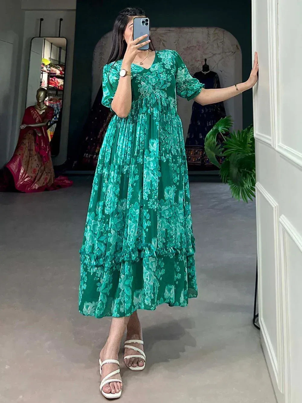 Green floral ethnic gown with tiered skirt, perfect for Indian wear occasions