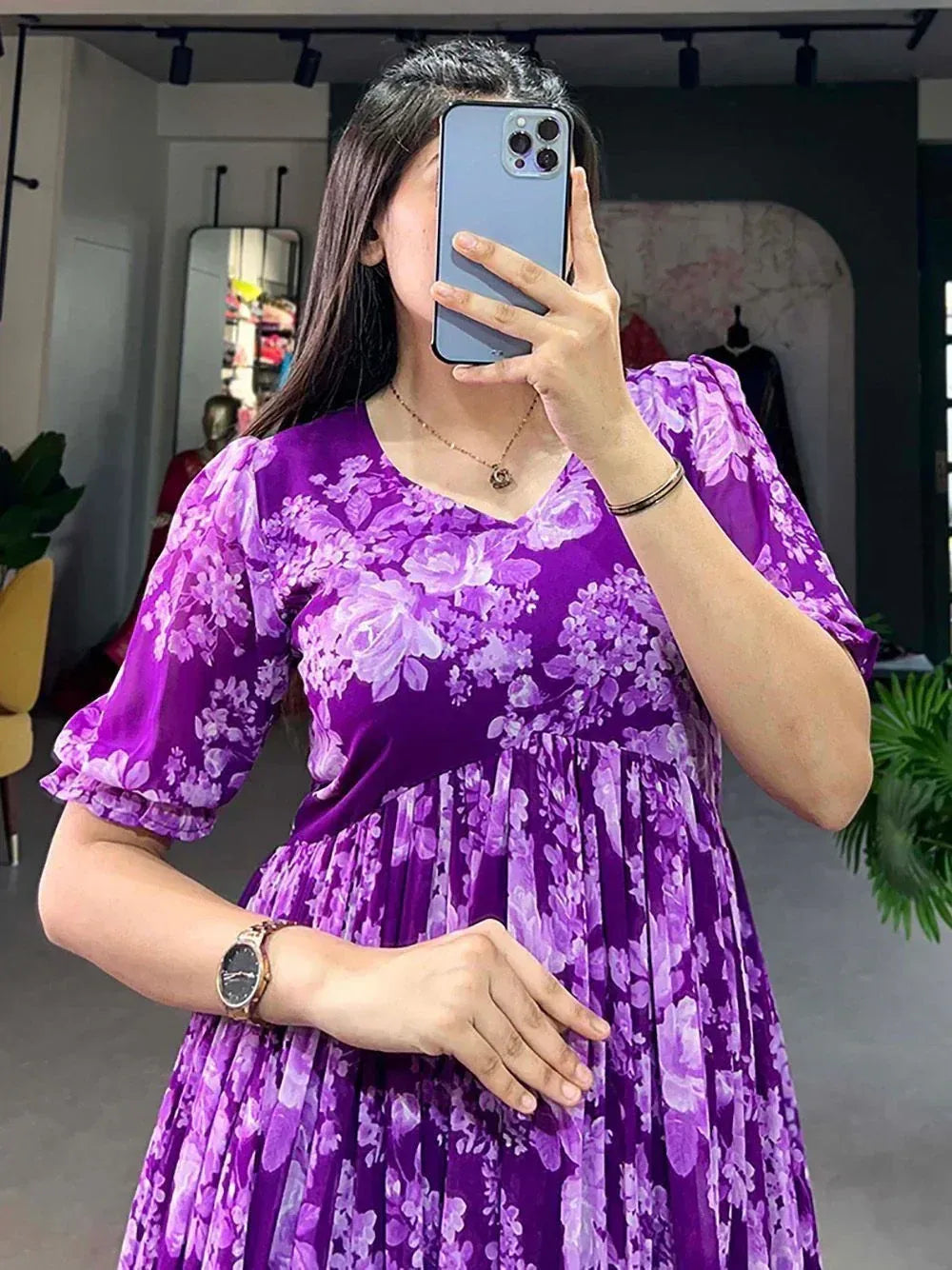 Purple floral ethnic gown with puff sleeves, perfect for Indian occasions and festive wear.
