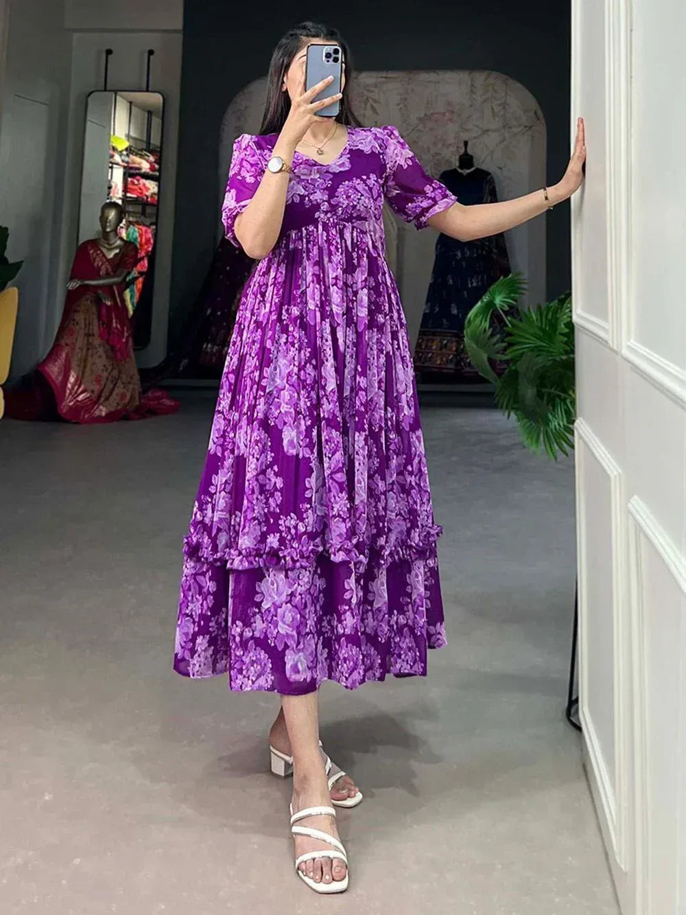 Purple floral ethnic gown with tiered skirt, perfect for Indian occasions and festive wear