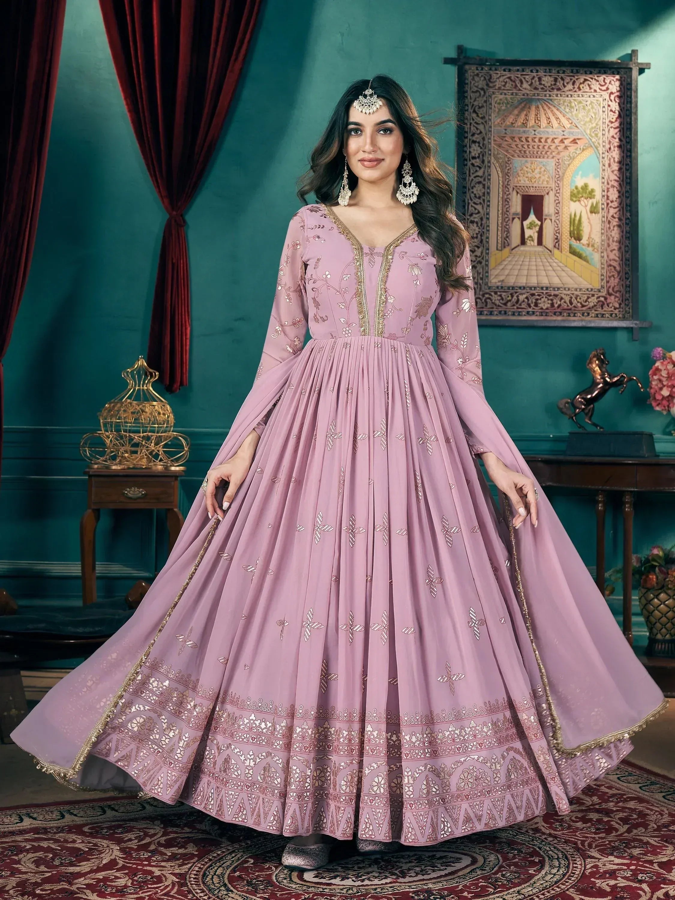 Elegant pink embroidered anarkali gown with gold detailing, perfect for Indian ethnic occasions