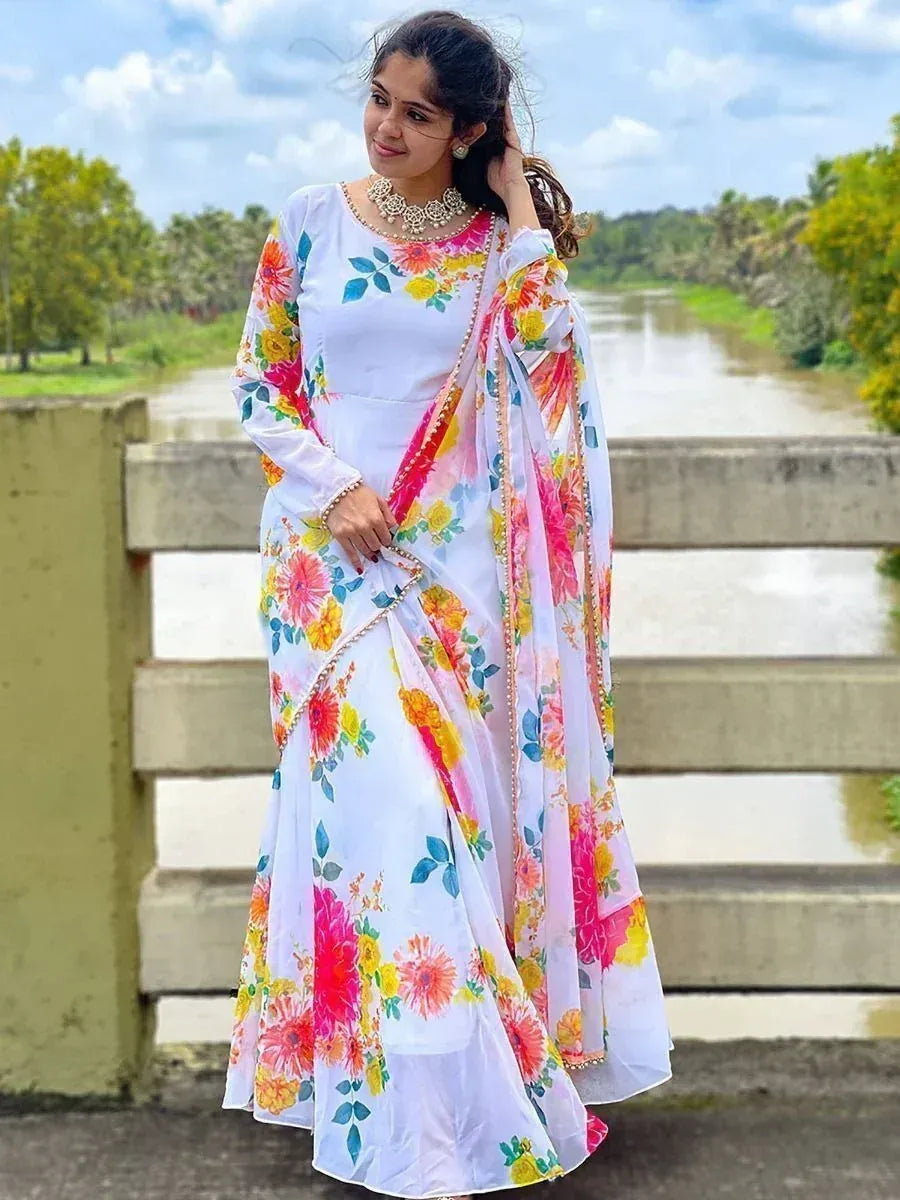 White floral print saree with vibrant colors, perfect for Indian ethnic wear occasions