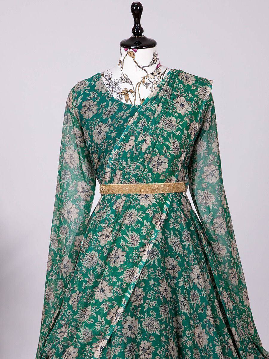 Emerald green floral print ethnic gown with gold belt, perfect for Indian occasions