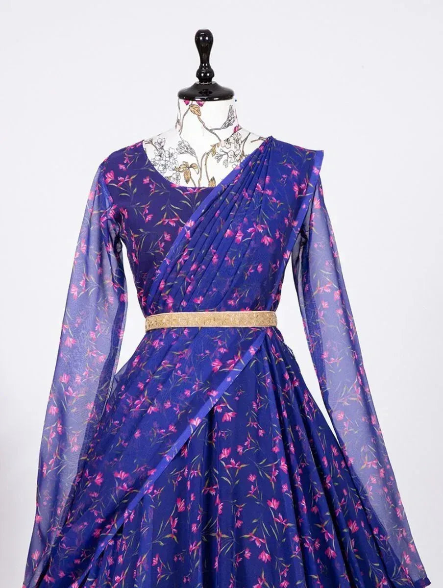 Blue floral ethnic gown with sheer sleeves and gold belt, perfect for Indian occasions