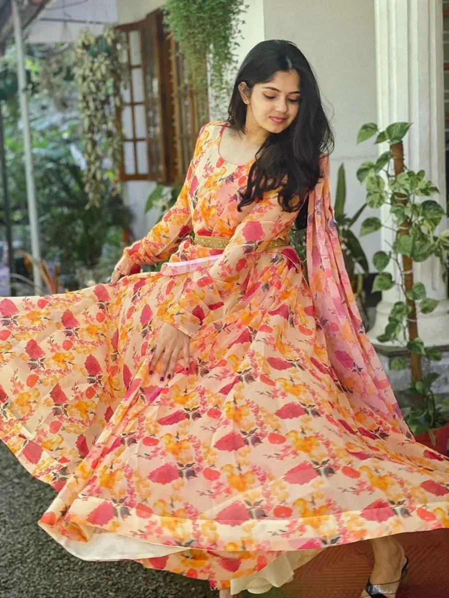 Floral print ethnic gown with long sleeves and flowing skirt, perfect for Indian occasions
