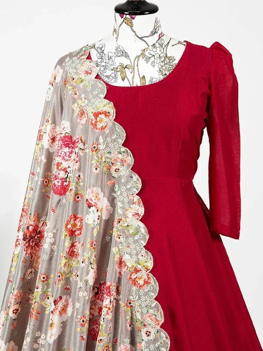 Red ethnic gown with floral dupatta, perfect for Indian weddings and festive occasions