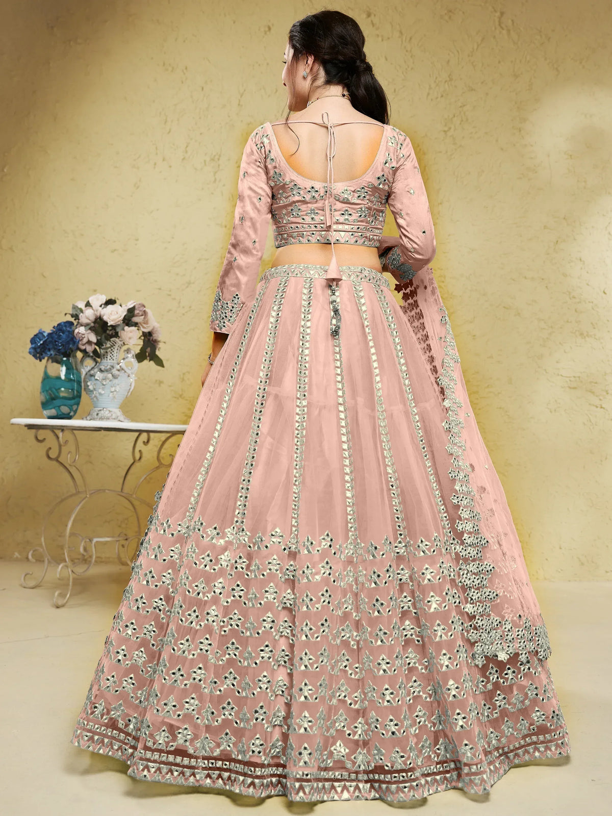 Pink designer lehenga choli with mirror work, back view, ethnic wear for women