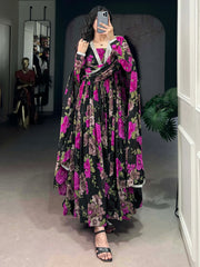 Woman wearing black floral printed ethnic gown with dupatta at Ethnic Plus store