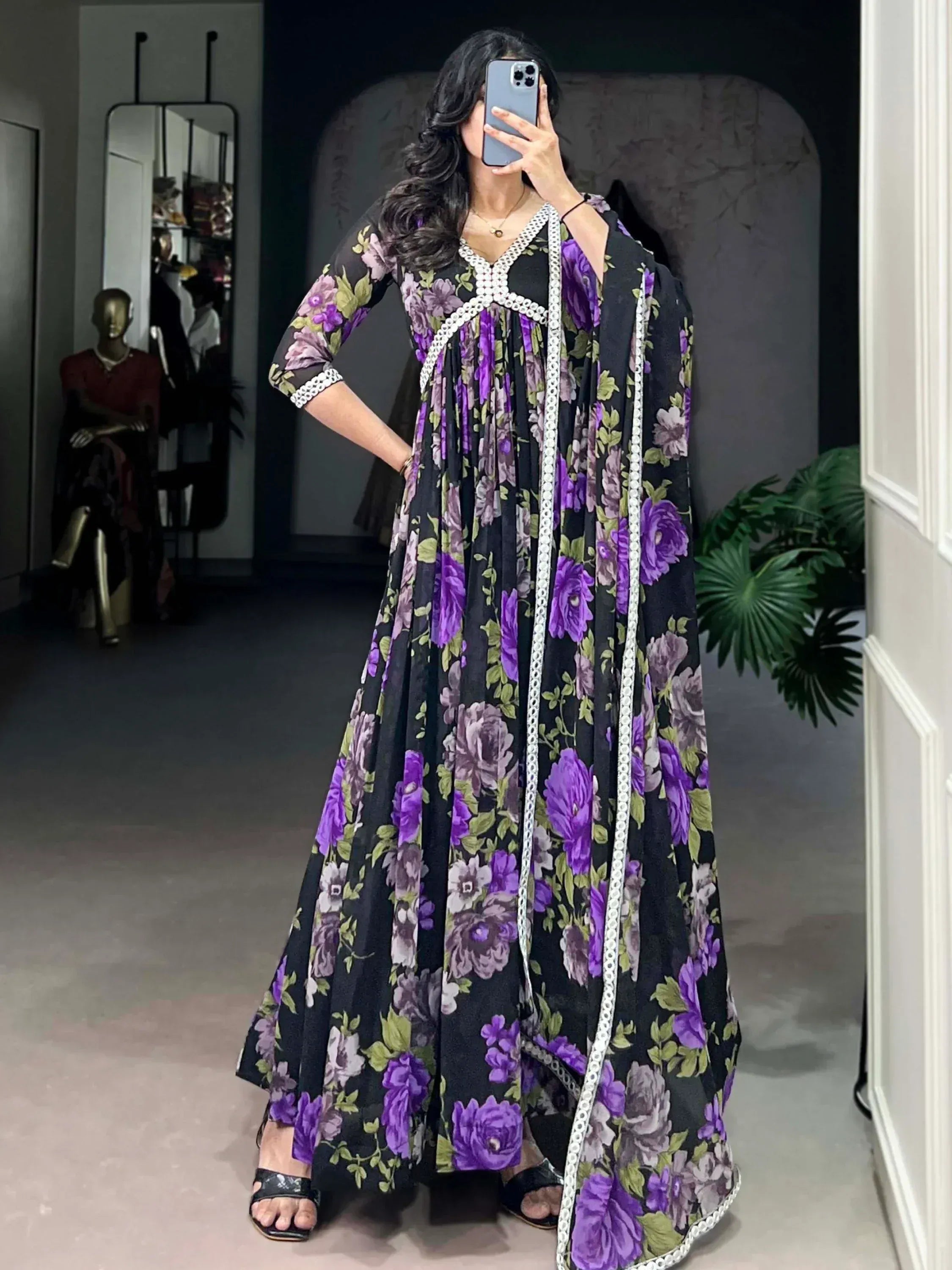 Black and purple floral ethnic gown with white lace detailing, perfect for Indian occasions