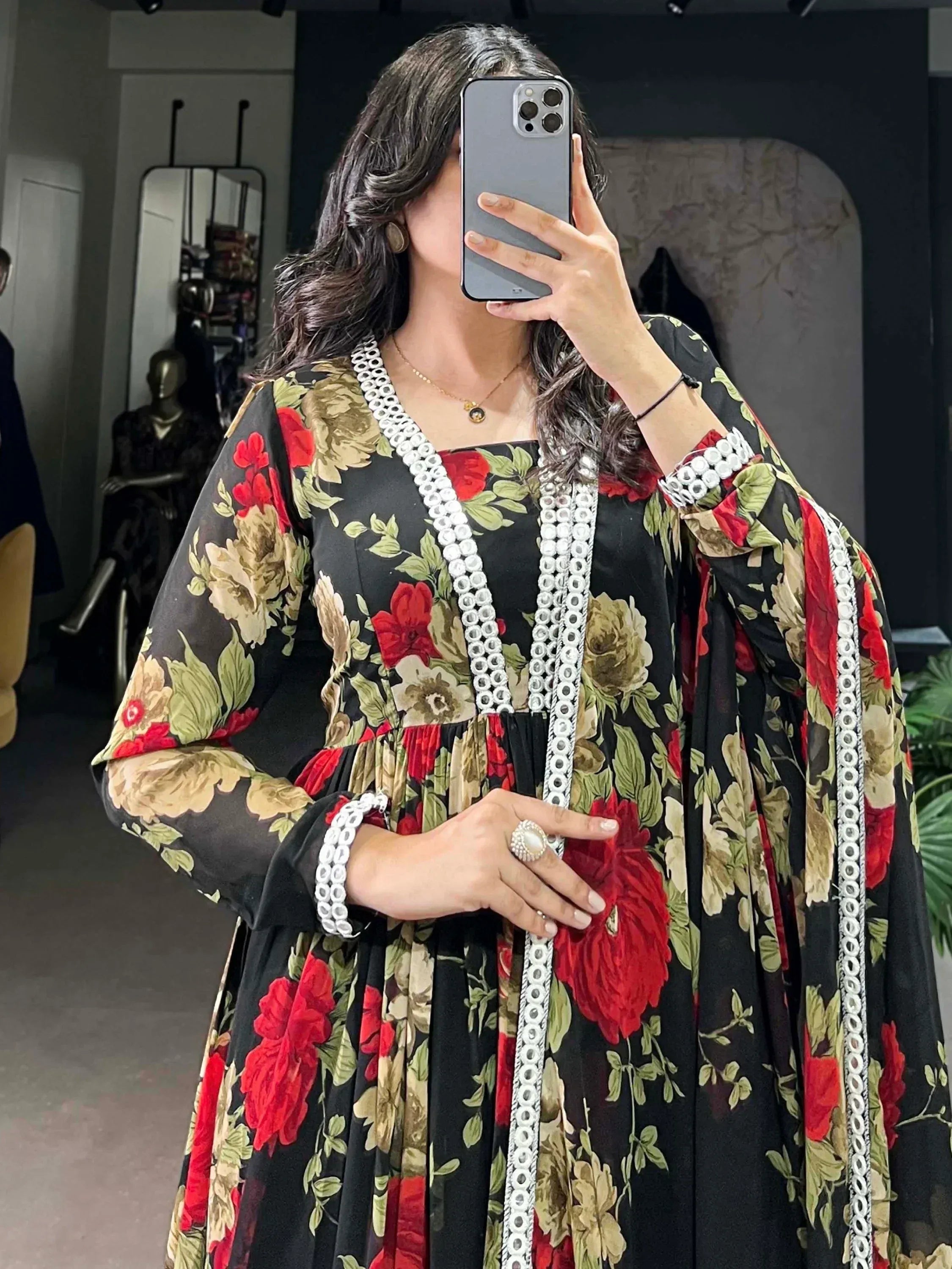 Black floral ethnic gown with white trim, perfect for Indian occasions and festive wear