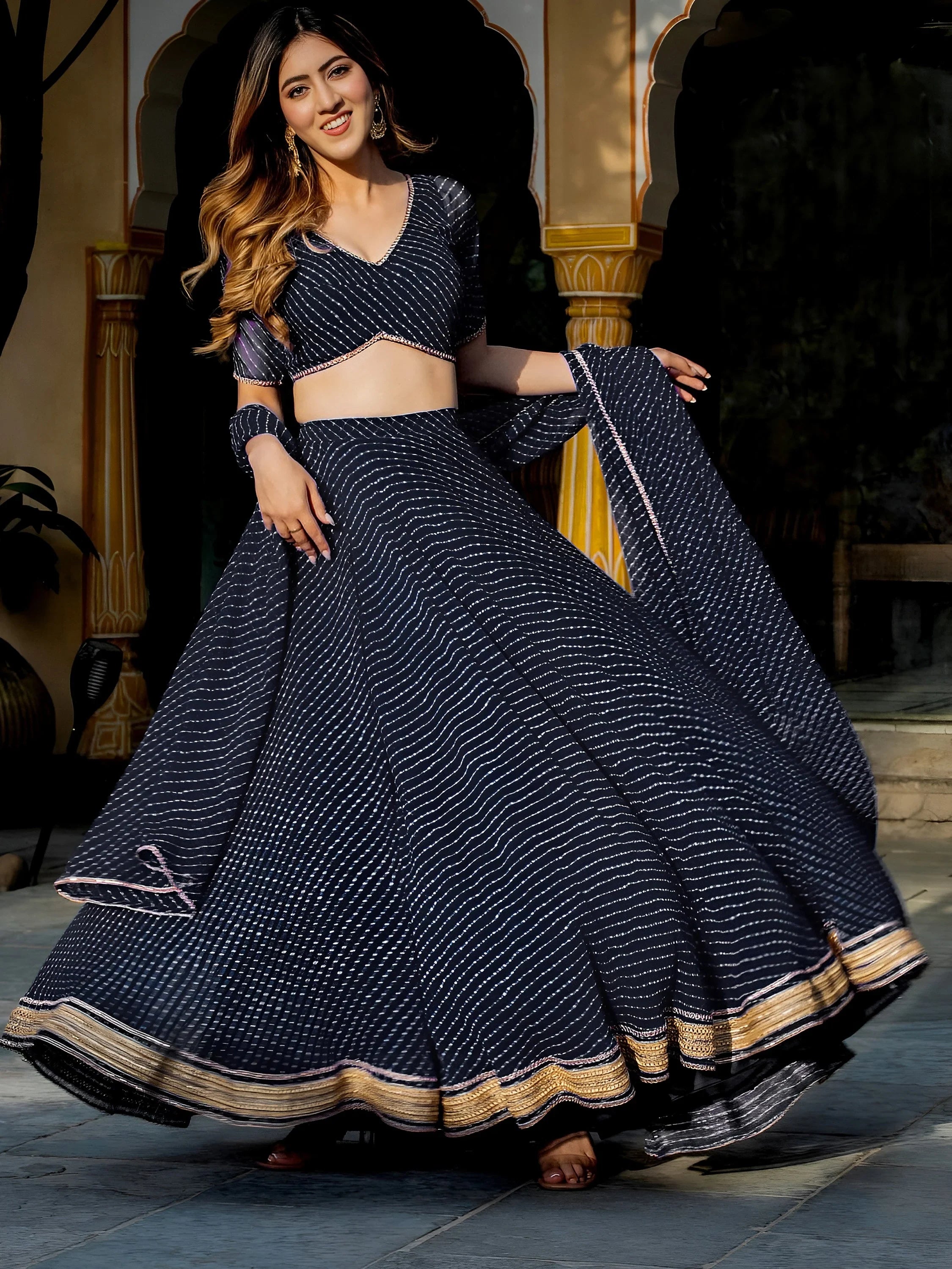 Captivating Black Laheriya Print Georgette Wedding Lehenga Choli