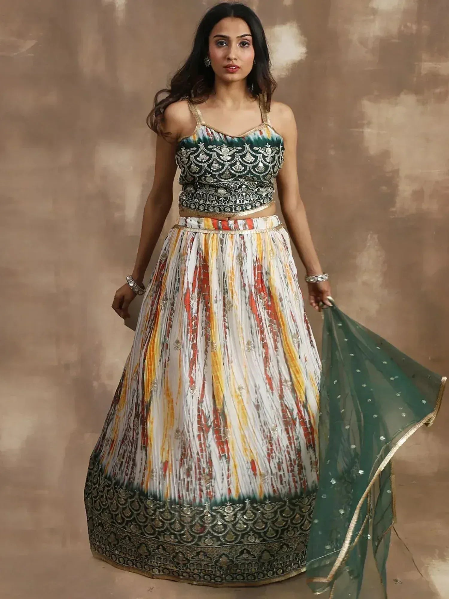Elegant green and multicolor lehenga choli with intricate embroidery and matching dupatta for Indian ethnic wear