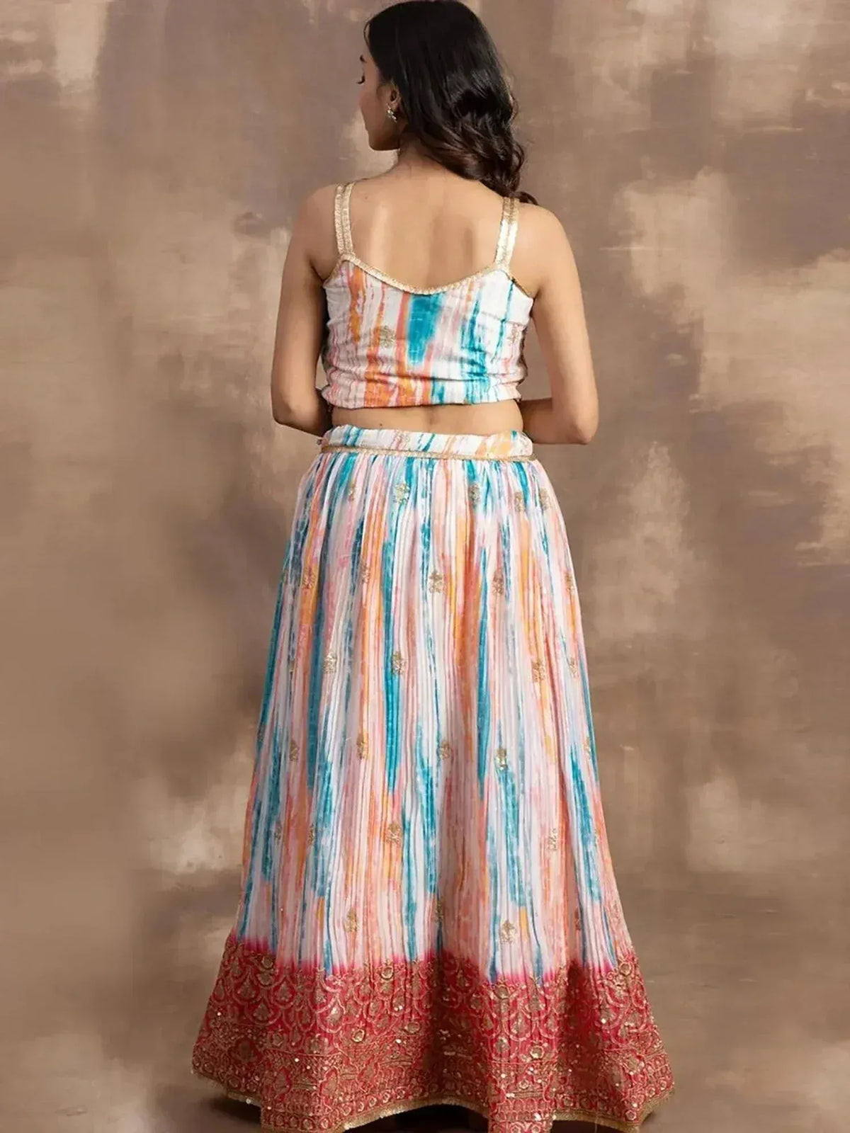 Colorful printed lehenga choli with gold embroidery and red border, Indian ethnic wear