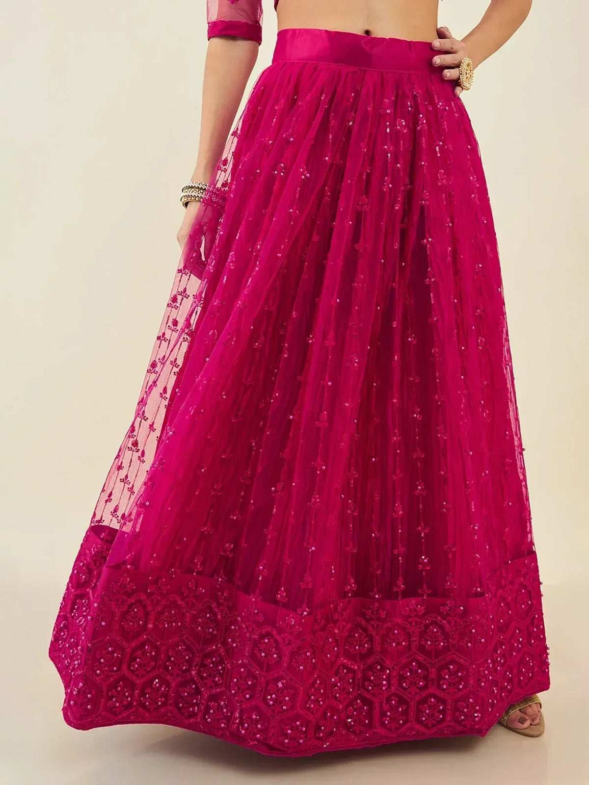 Fuchsia pink embroidered lehenga skirt with sequin detailing and lace hem for Indian ethnic wear