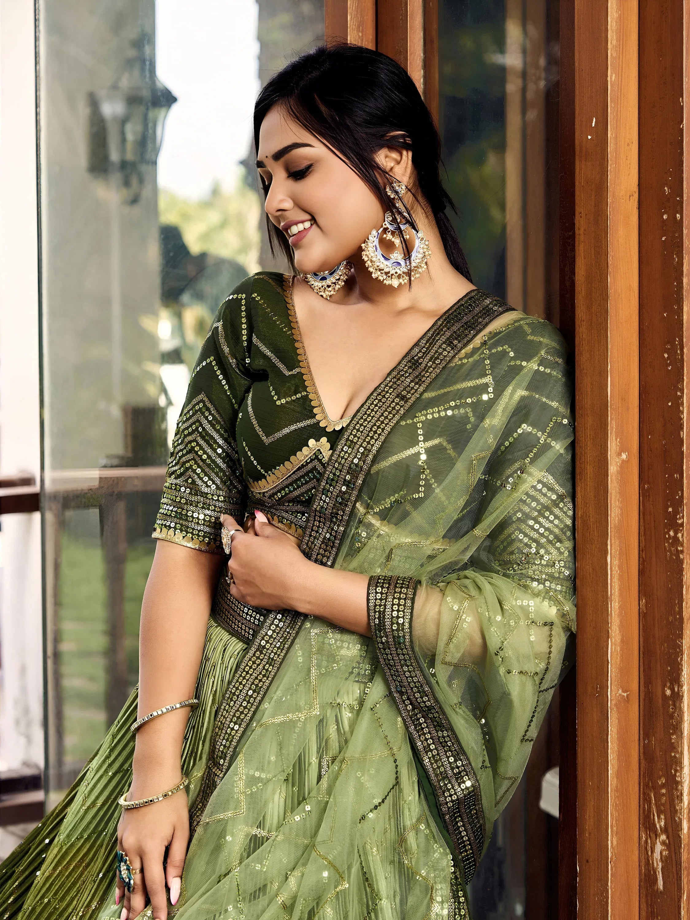 Awesome Green Sequins Chinon Mehendi Wear Lehenga Choli