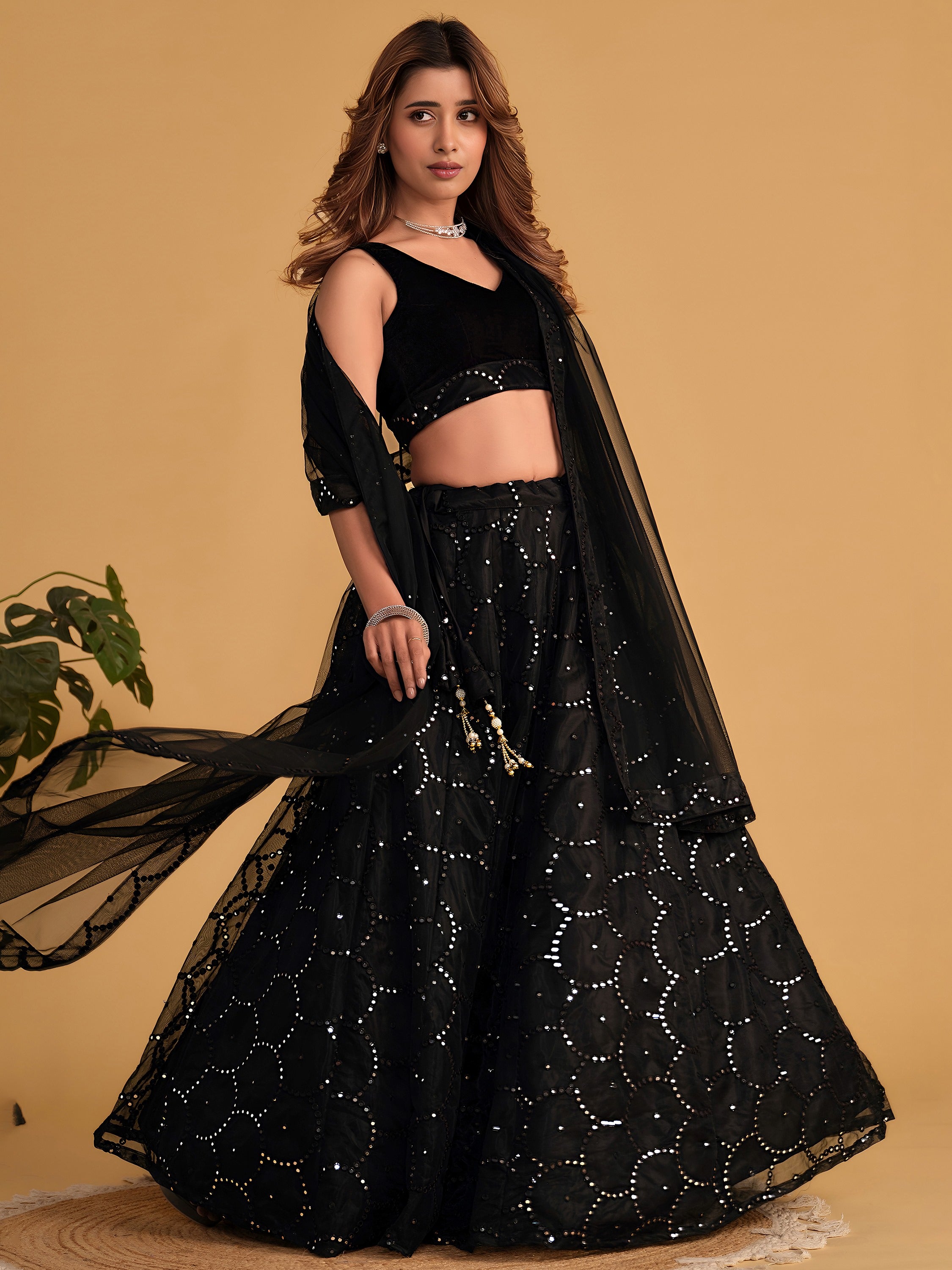 Mesmerizing Black Mirror Work Organza Reception Wear Lehenga Choli