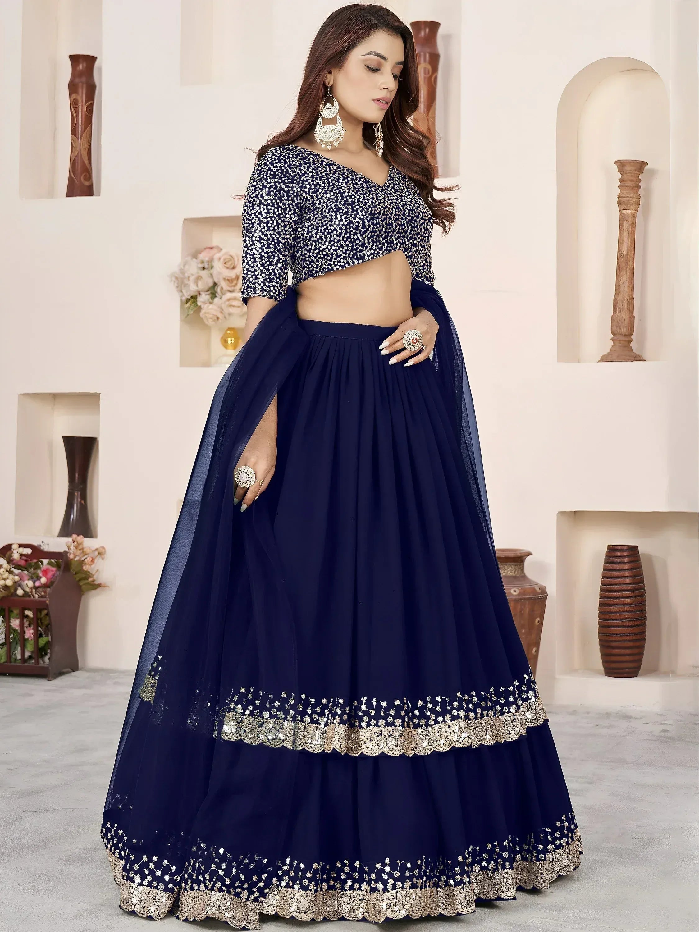 Enchanting Blue Sequins Georgette Function Wear Lehenga Choli