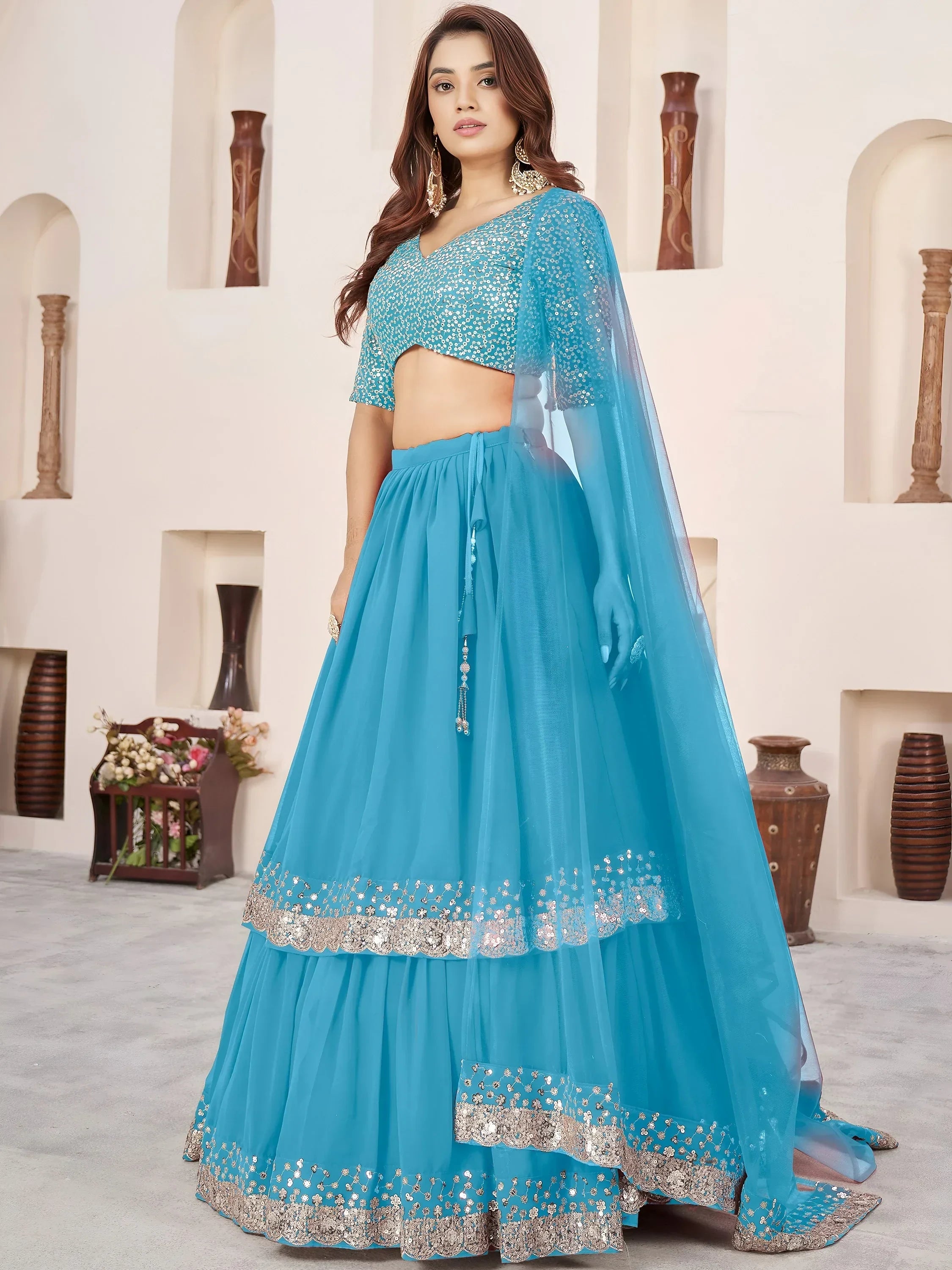 Dazzling Sky Blue Sequins Georgette Sangeet Wear Lehenga Choli