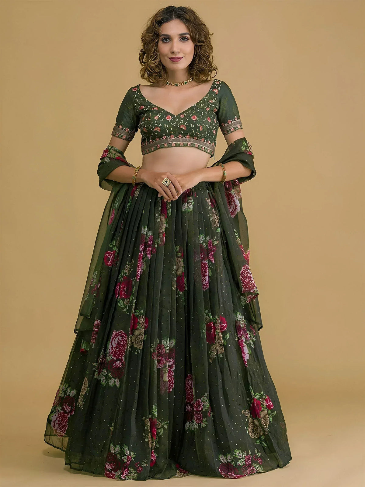 Green floral lehenga choli with intricate embroidery and sheer dupatta for ethnic wear