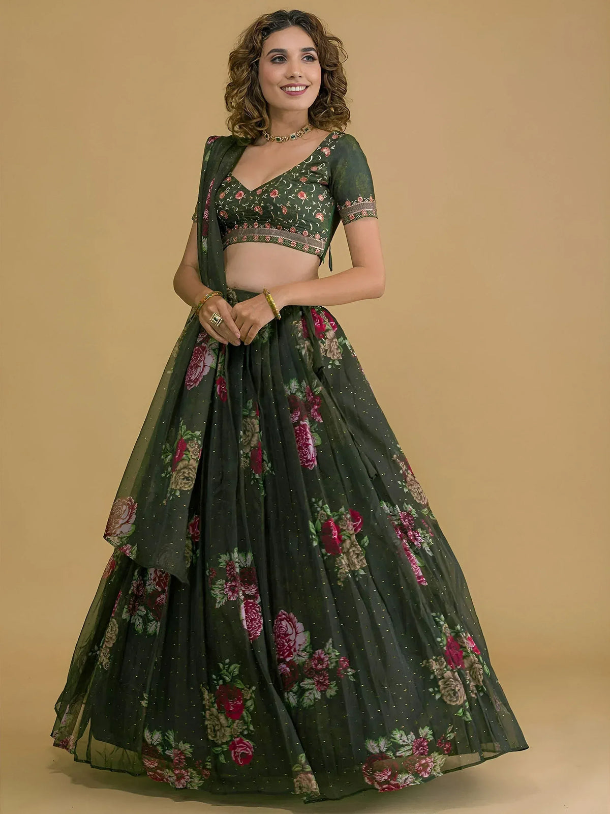 Green floral lehenga choli with embroidered blouse and dupatta, perfect for Indian ethnic wear occasions