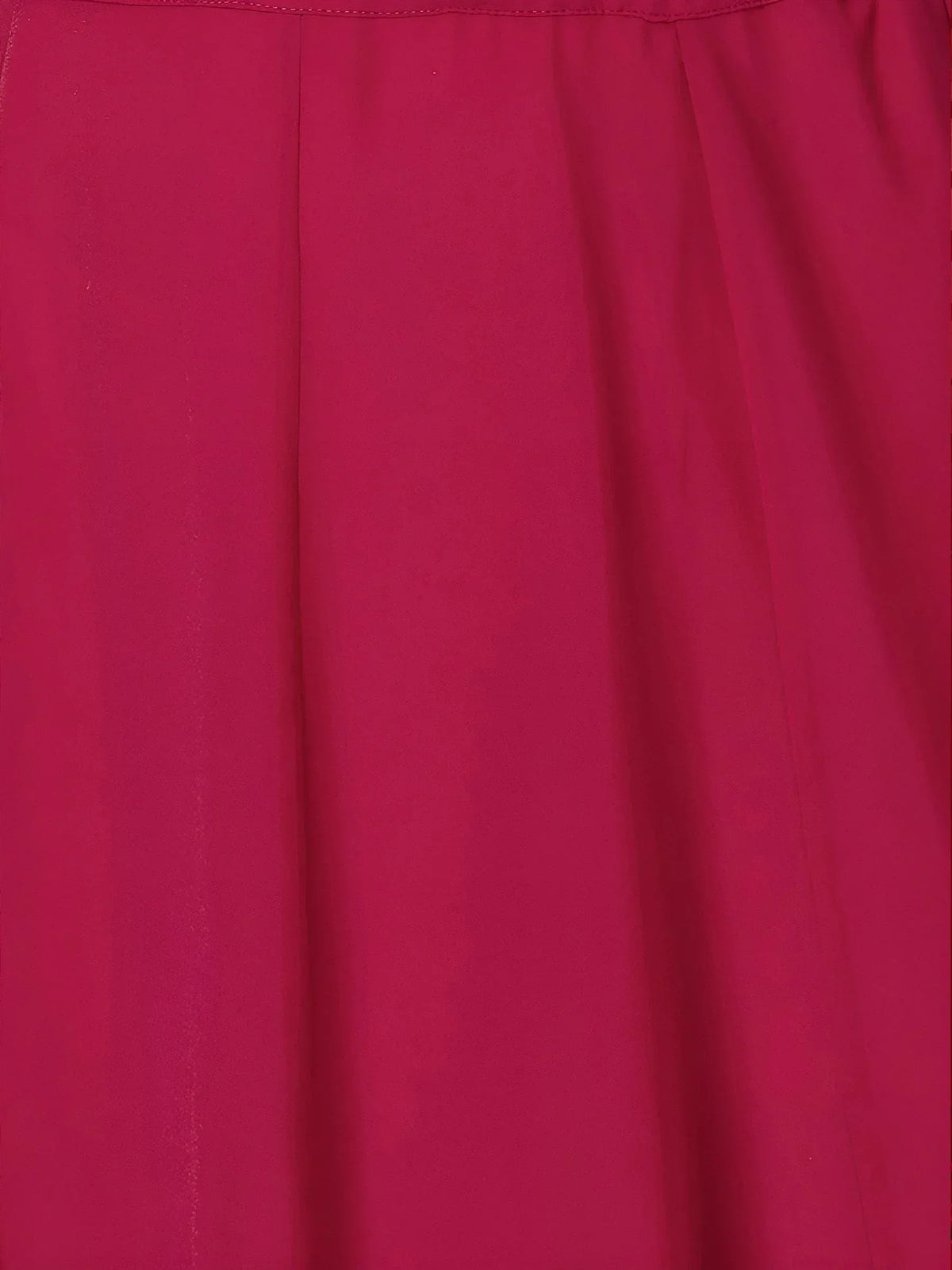 Vibrant magenta ethnic gown with elegant pleats and smooth fabric texture