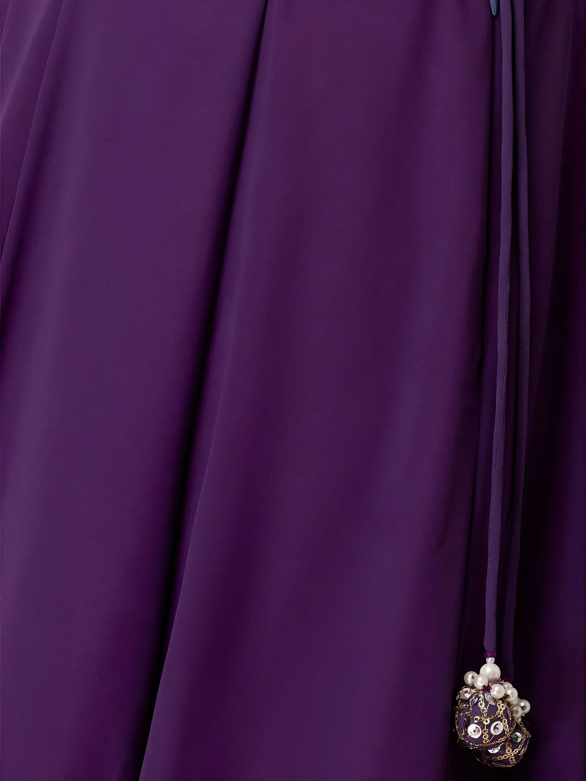 Purple ethnic gown with pearl and sequin embellishment