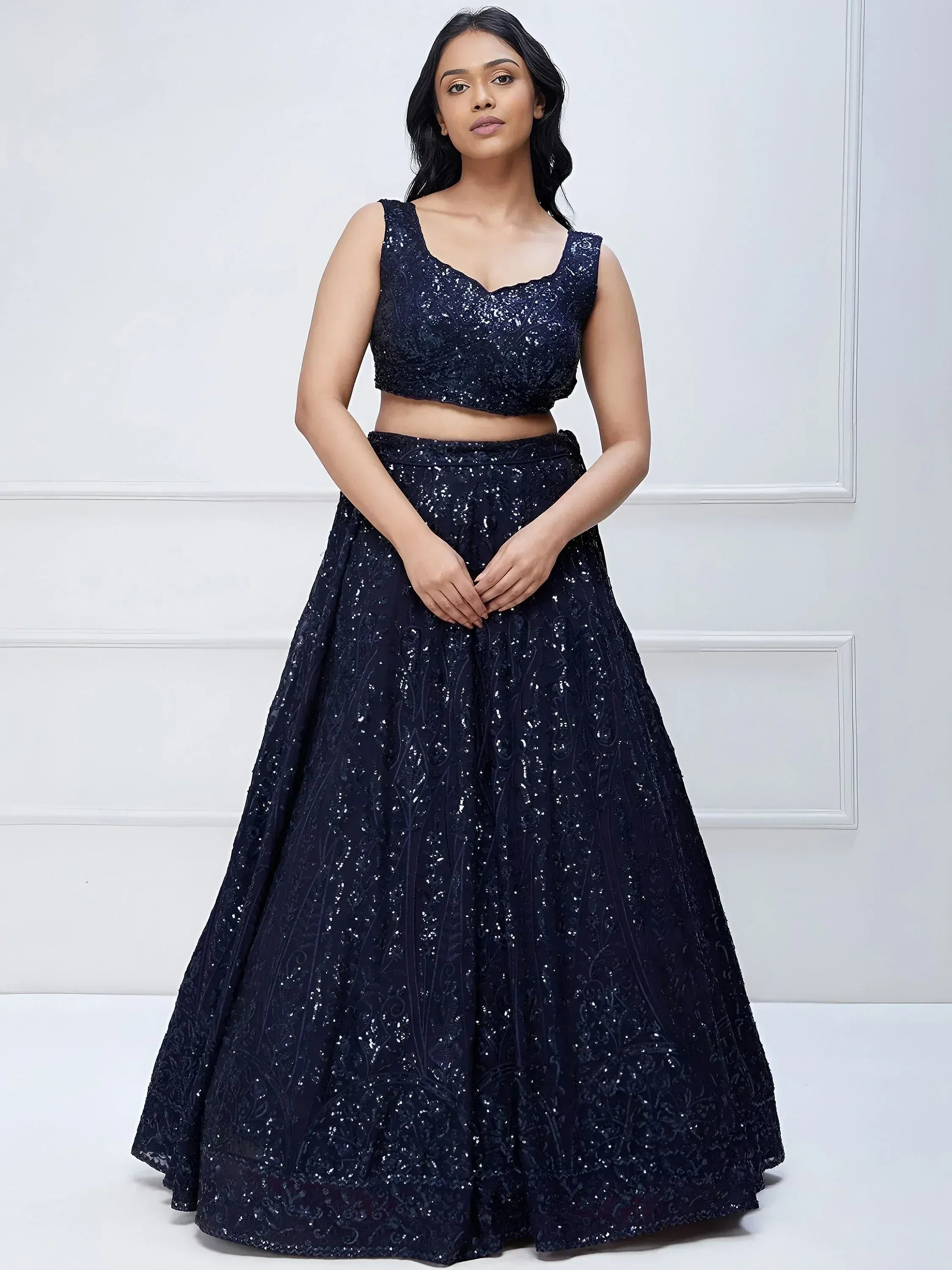 Navy blue sequin lehenga choli with floral embroidery, perfect for Indian weddings and festive occasions