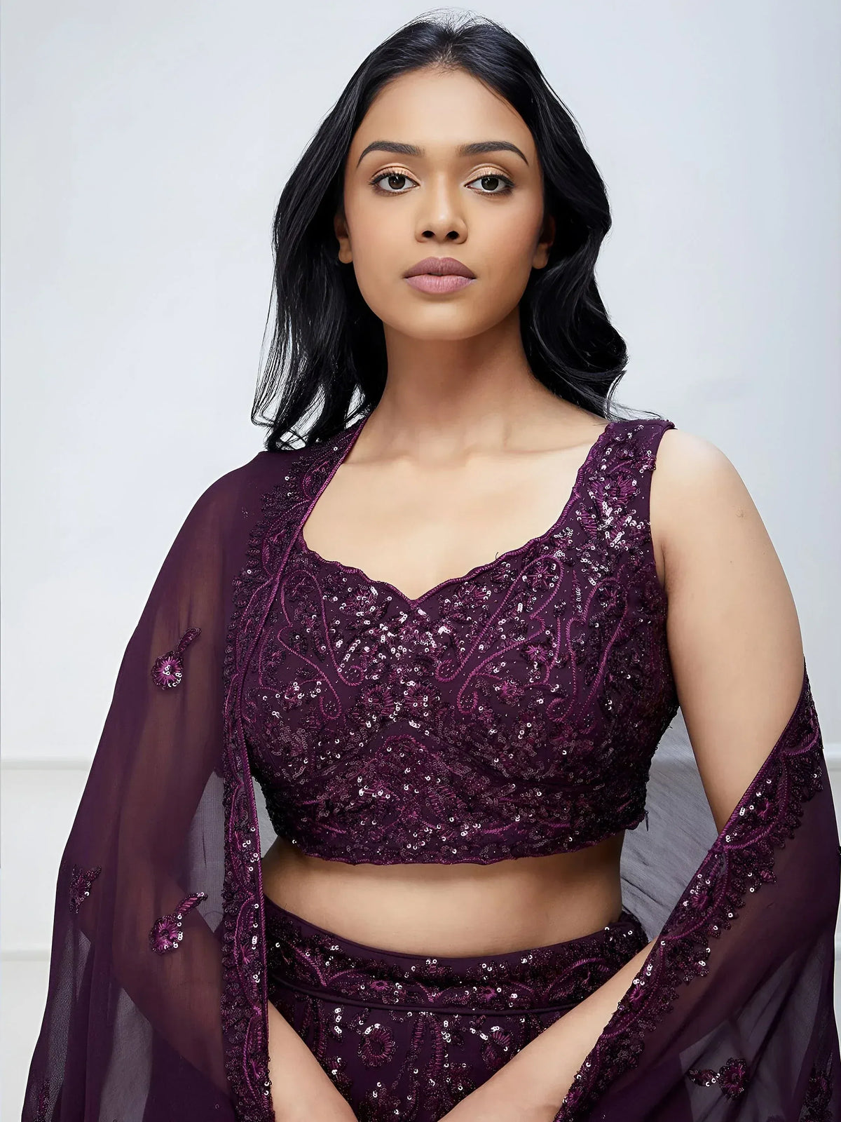 Elegant purple sequin lehenga choli with sheer dupatta, perfect for Indian ethnic occasions