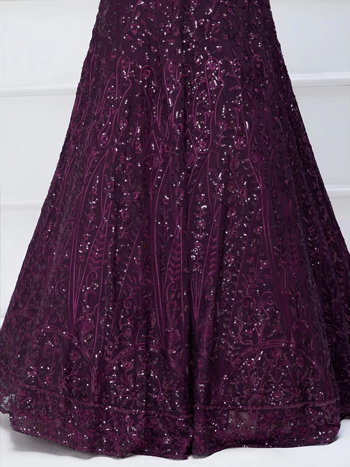 Purple sequin-embroidered lehenga skirt with intricate floral patterns, ideal for Indian ethnic wear
