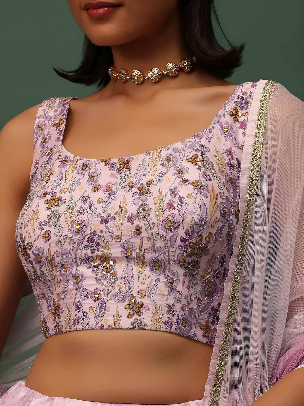 Pink floral embroidered lehenga choli with gold mirror work and sheer dupatta, perfect for Indian ethnic wear