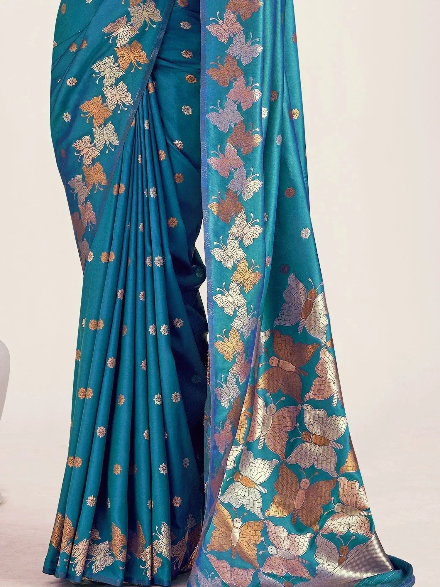Teal saree with gold and silver butterfly print, elegant Indian ethnic wear for women