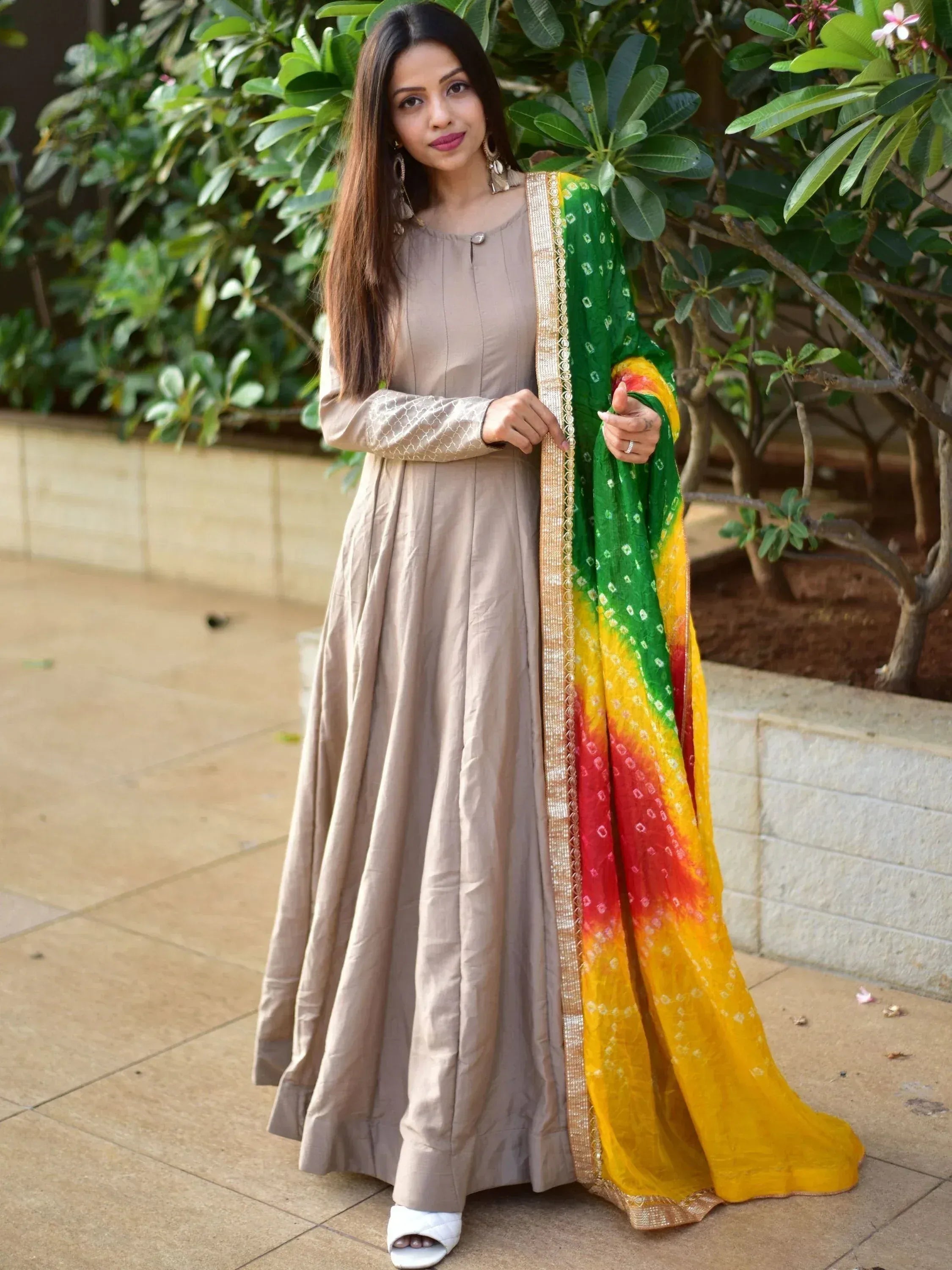 Elegant beige anarkali with colorful tie-dye dupatta, perfect for Indian ethnic wear