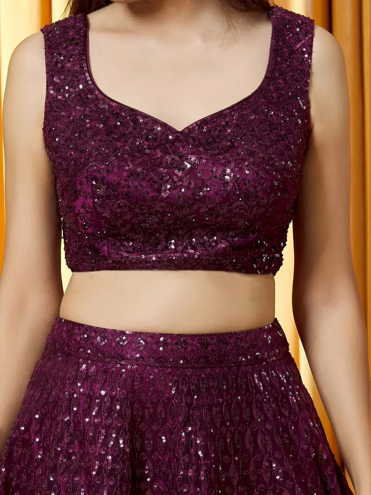 Purple sequin lehenga choli with floral embroidery, perfect for Indian ethnic wear events