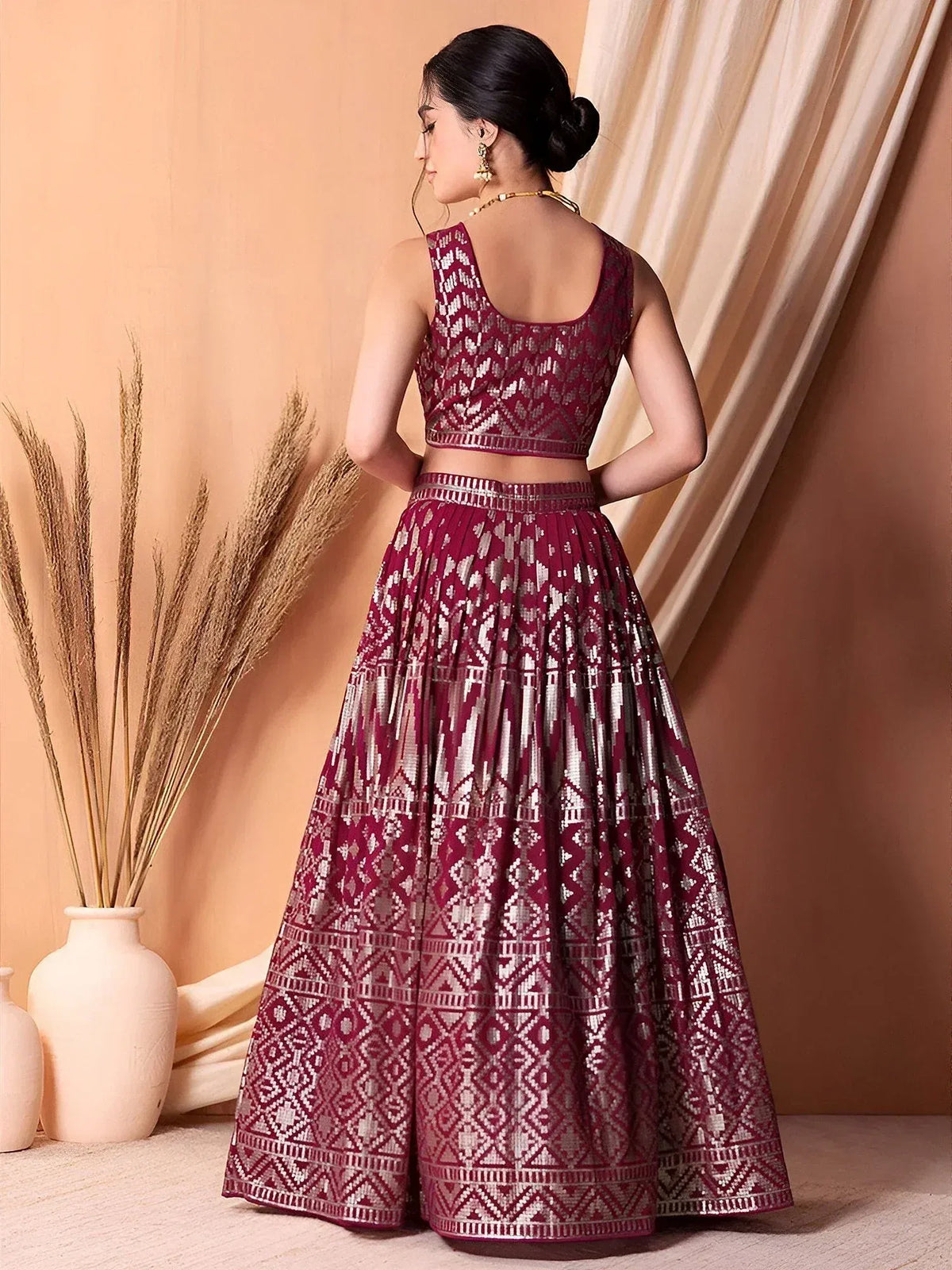 Maroon and silver ethnic lehenga choli with geometric print, back view