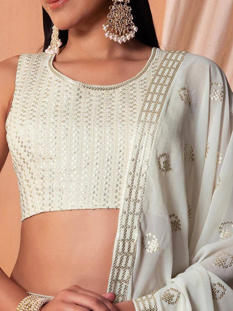 Elegant white embroidered crop top with matching dupatta, perfect for ethnic wear