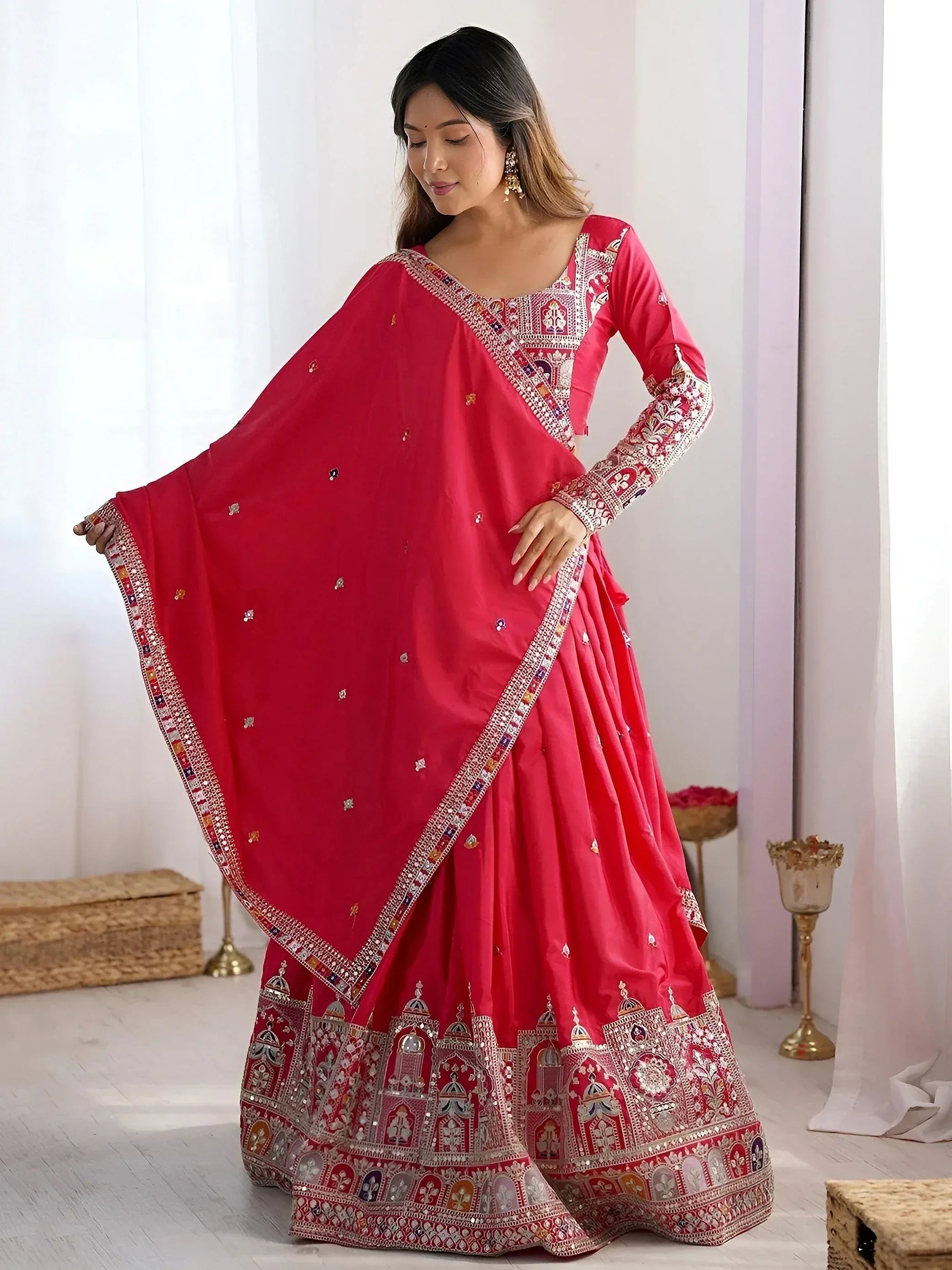 Red embroidered lehenga choli with mirror work and dupatta, Indian ethnic wear for women