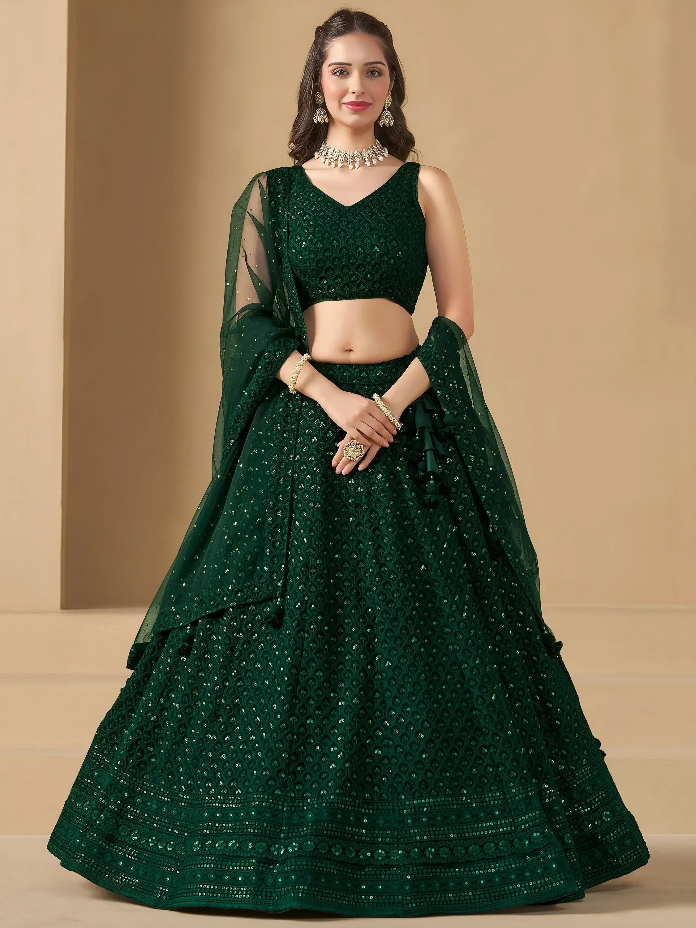 Emerald green designer lehenga choli with sequin embroidery and sheer dupatta for Indian ethnic wear