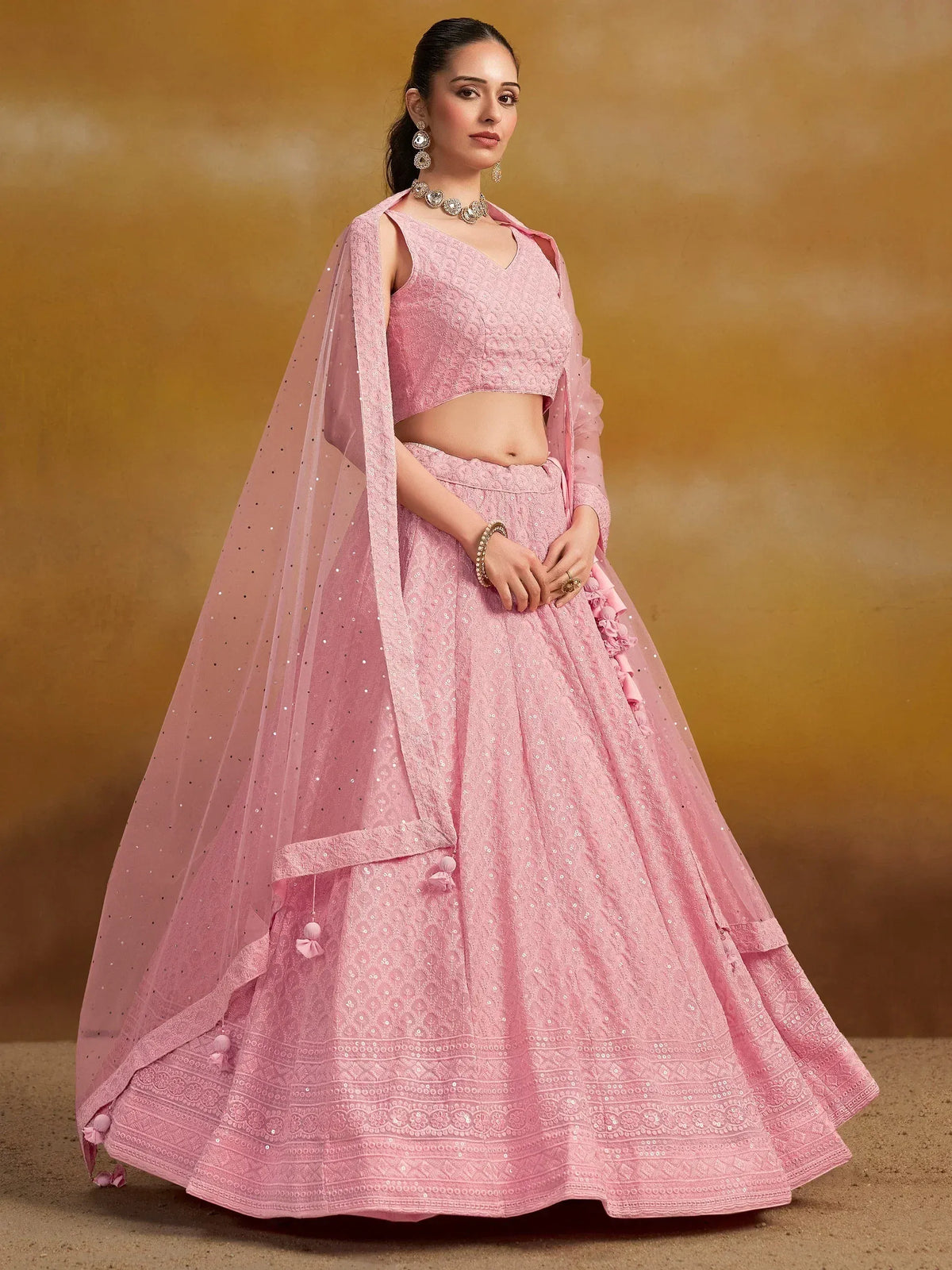 Pink designer lehenga choli with sequin work and sheer dupatta for Indian ethnic wear