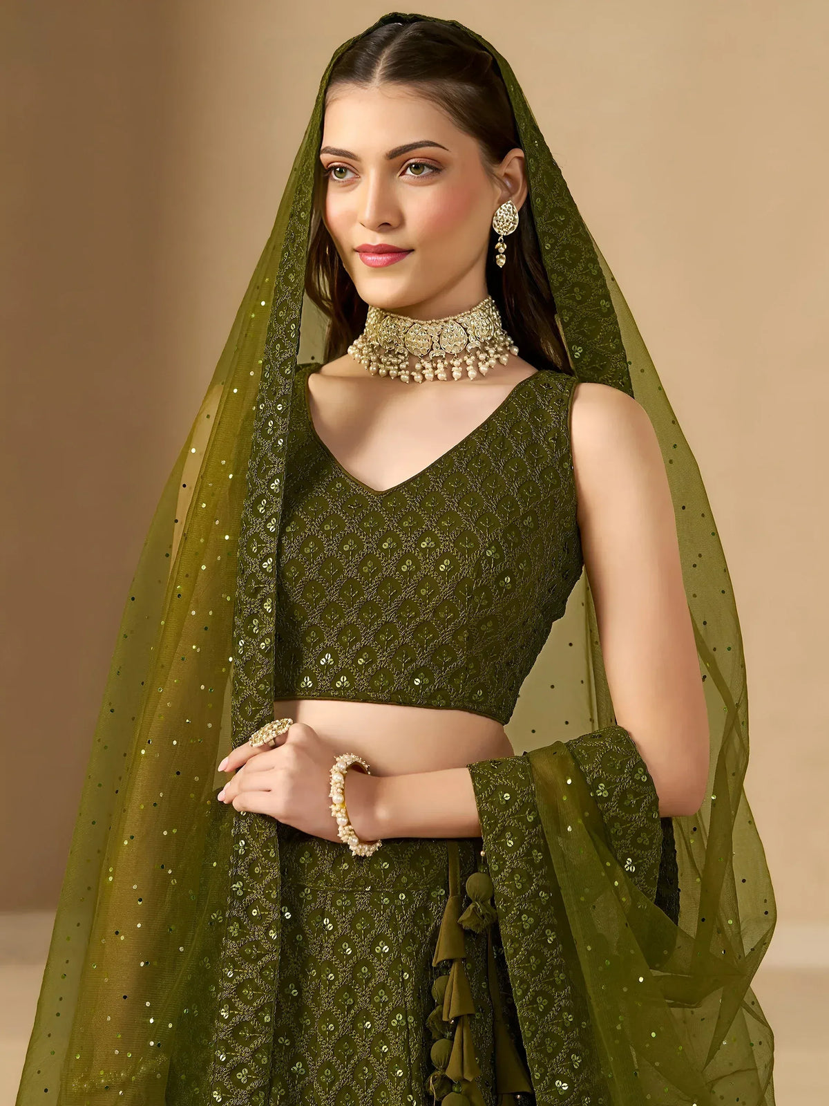 Olive green embroidered lehenga choli with sequins and matching dupatta, perfect for Indian ethnic wear