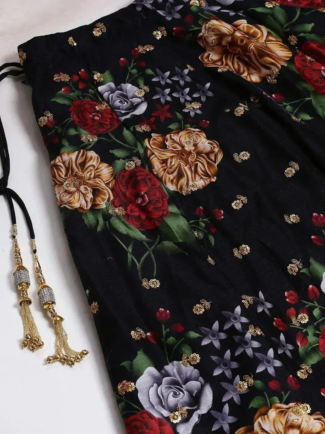 Black floral ethnic gown with gold sequins and tassel drawstring, perfect for Indian occasions