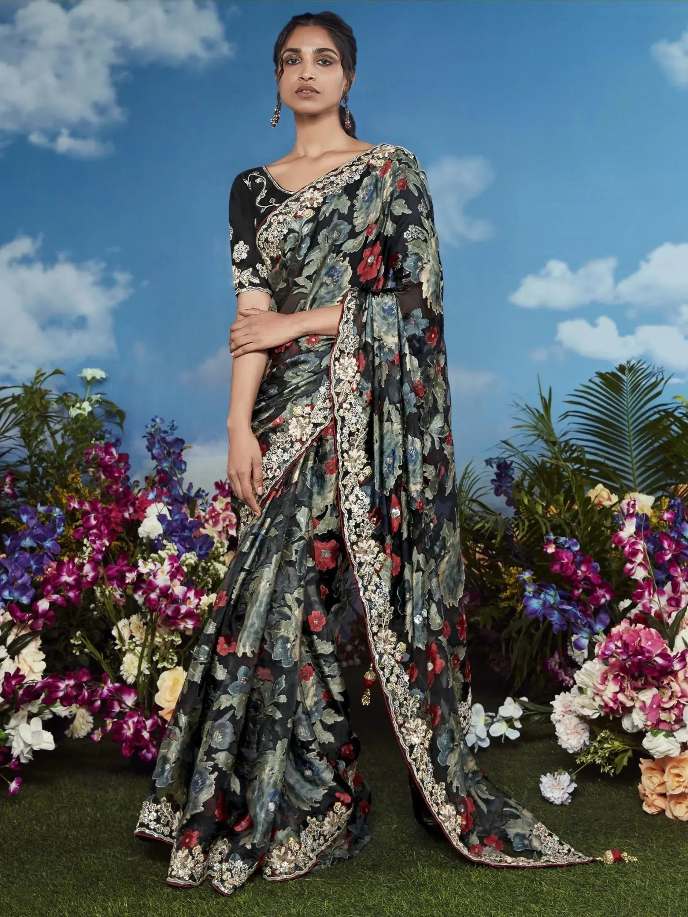 Black floral embroidered saree with gold detailing, perfect for Indian ethnic occasions