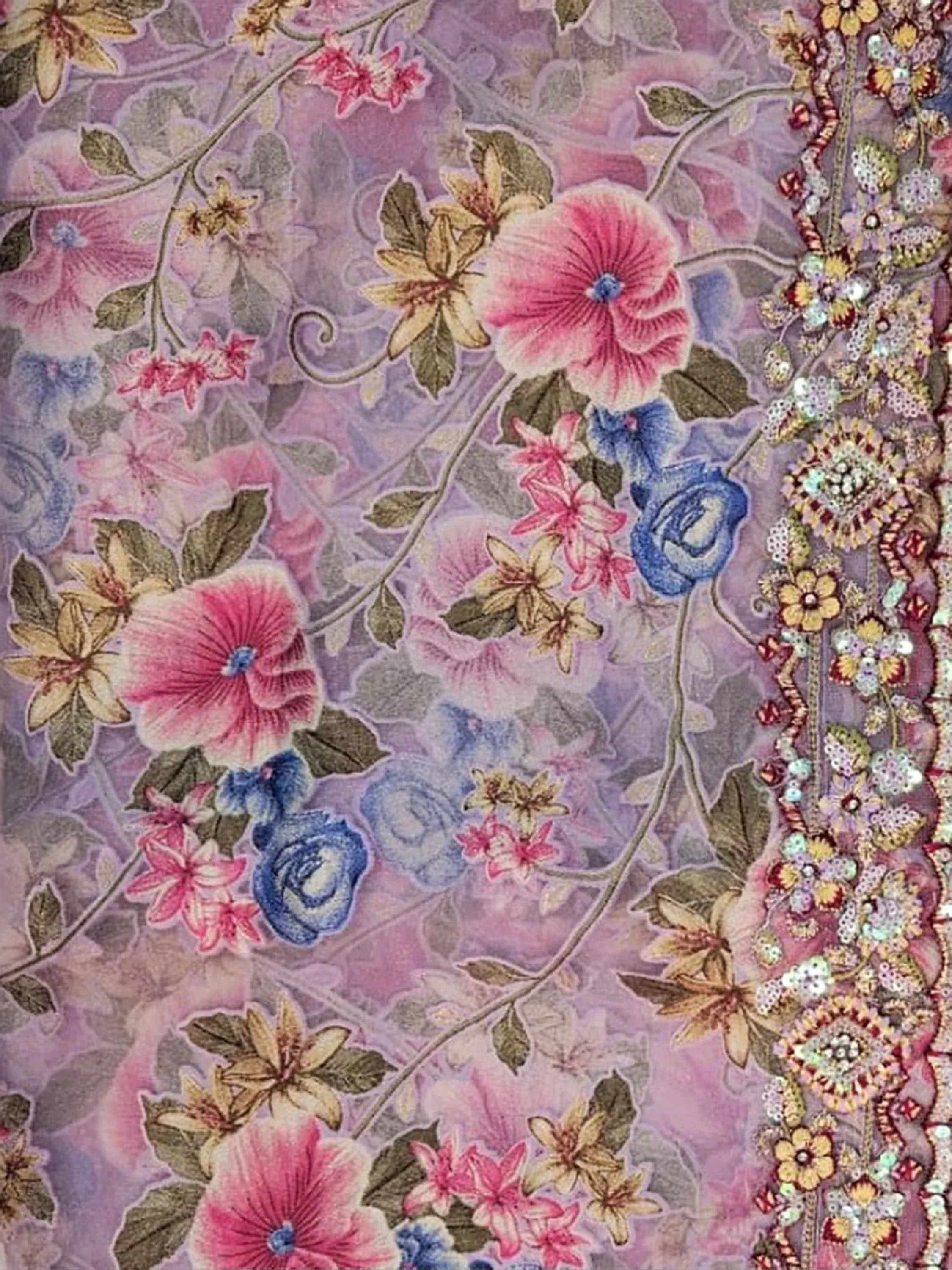 Floral printed ethnic fabric with pink, blue, and gold flowers, perfect for lehenga or saree designs