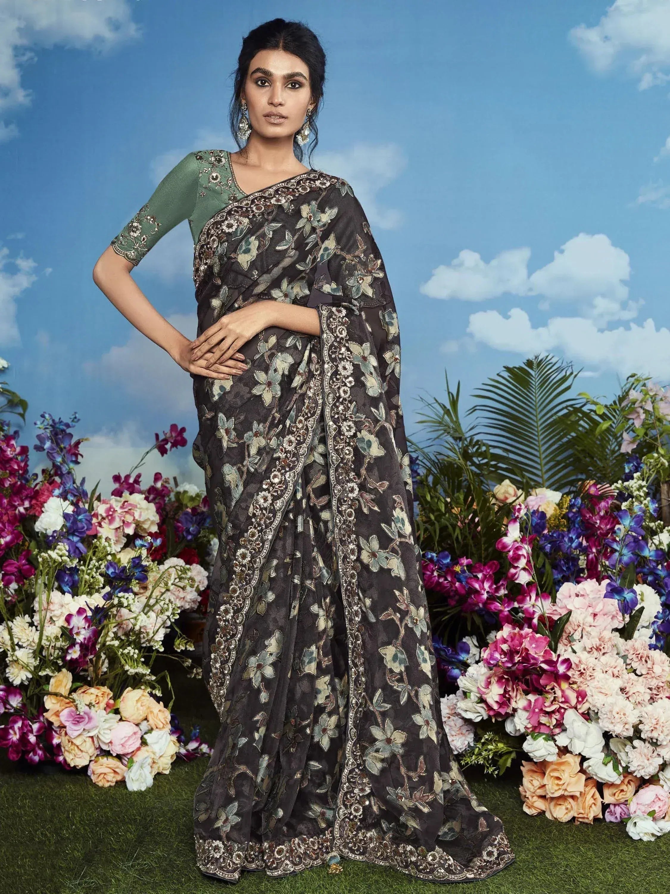 Elegant floral embroidered saree with green blouse, perfect for Indian ethnic occasions and events.