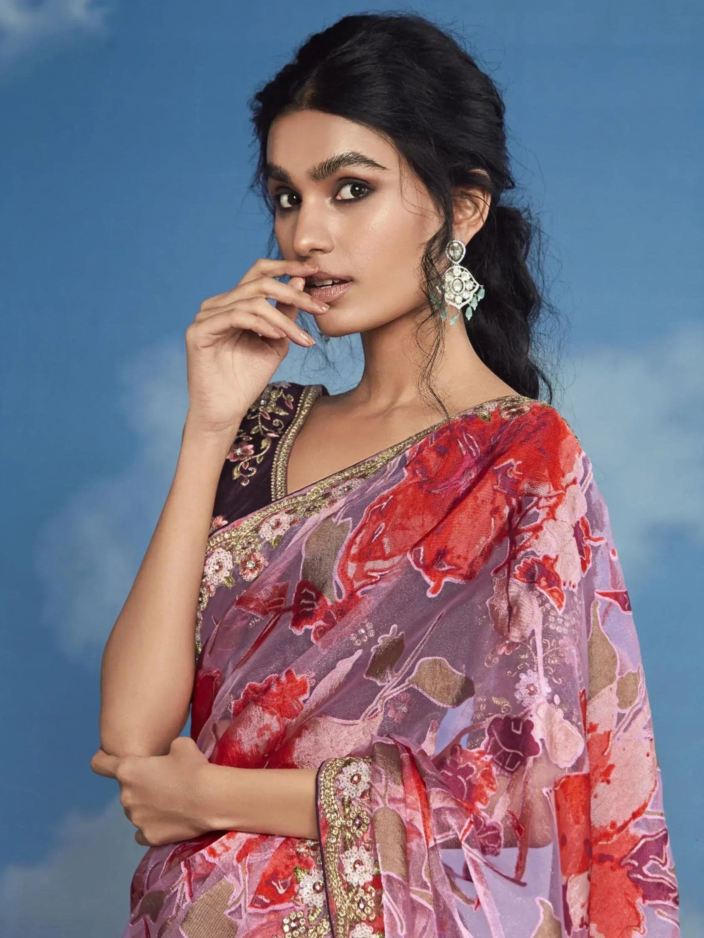 Woman in floral printed saree with embroidered blouse, ethnic Indian wear