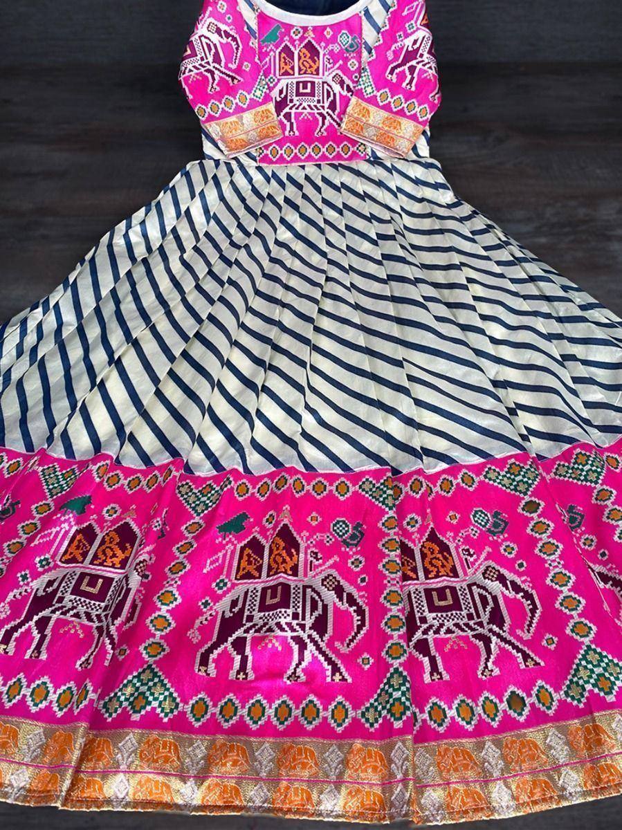 Pink and white striped ethnic gown with elephant print, perfect for Indian festivals and weddings.