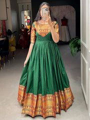 Adorning Green Cotton Zari Weaving Festival Wear Gown