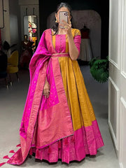 Prodigious Mustard Yellow Zari Weaving Silk Haldi Wear Gown With Belt